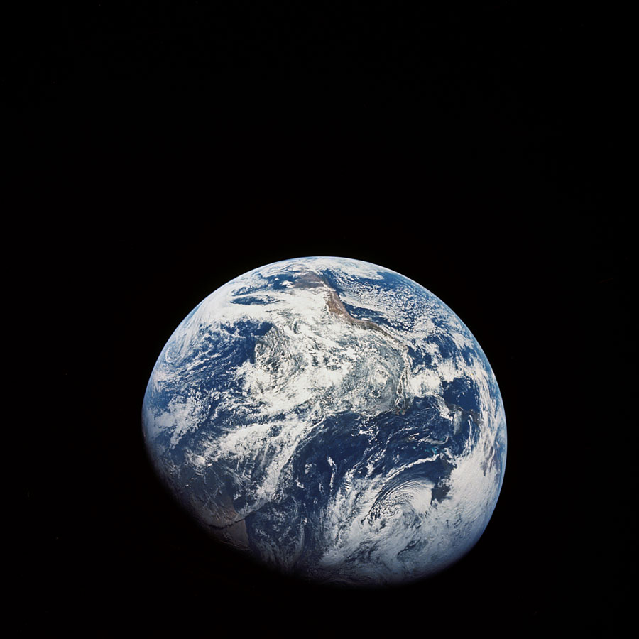 a812231 Looking back at earth from Apollo 8.
