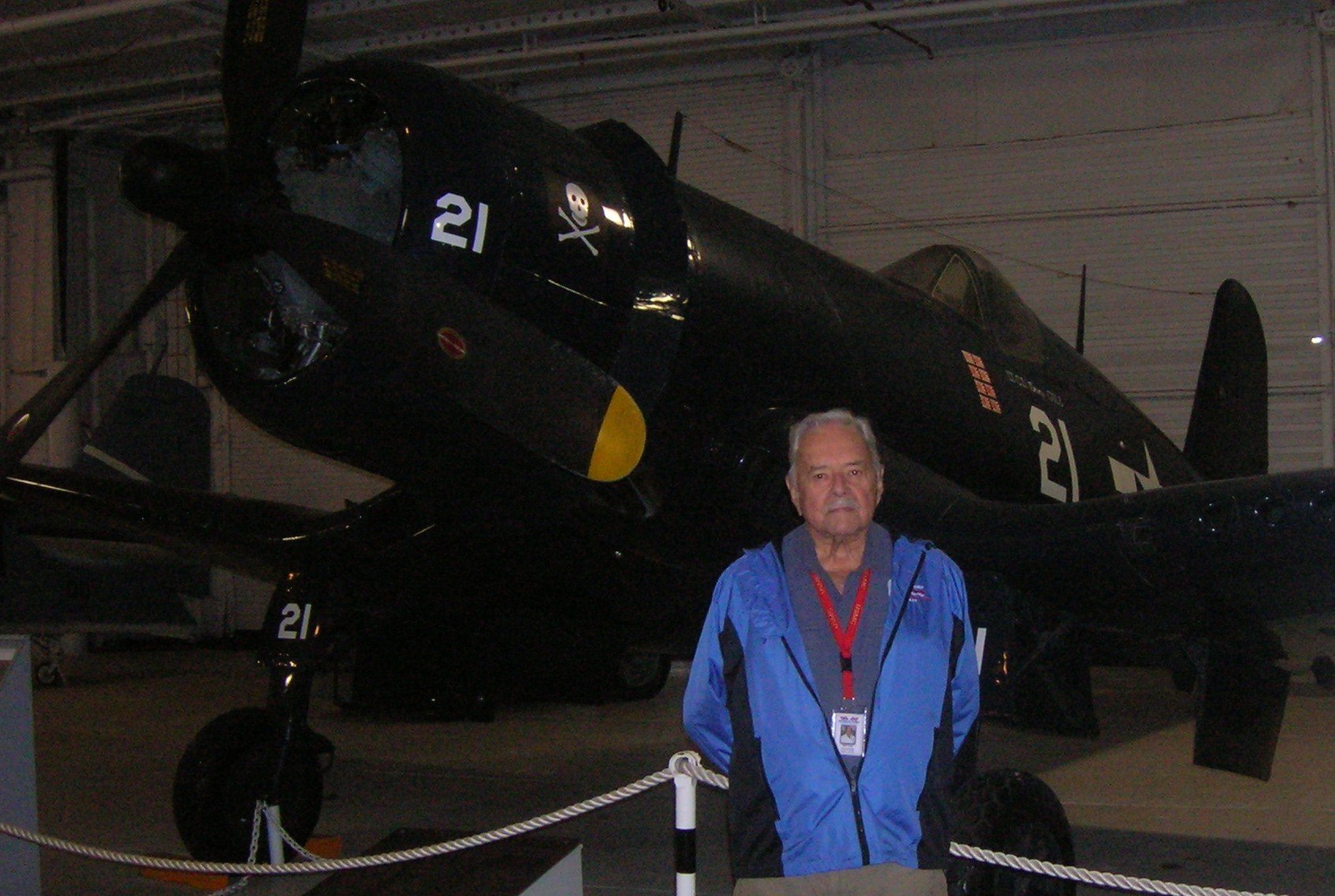 cartcorsair World War 2 Marine fighter pilot Bill Cart in front of Patriots Point Corsair.