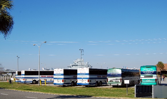 Six busses in the Patriots Point parking lot on 06 February.