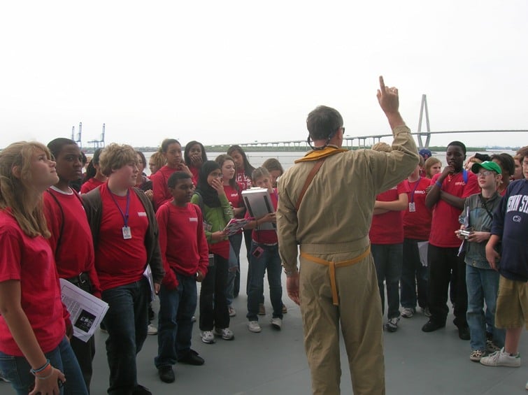 On the flight deck of USS Yorktown (new Cooper River bridge in distance) ELW students learn about aircraft carrier technologies that helped us win the Pacific war.