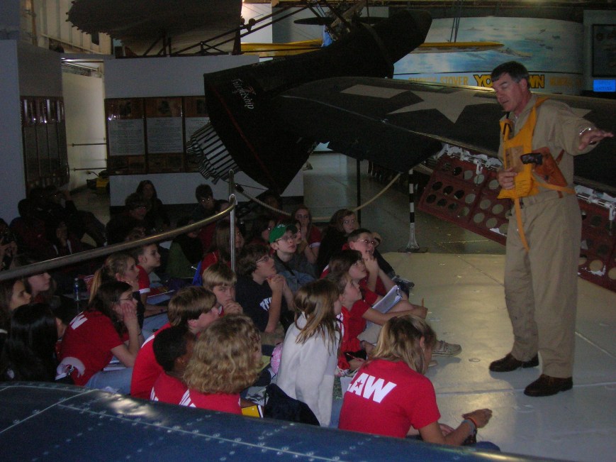 E. L. Wright students learn about the technology and effectiveness of the SBD Dauntless.