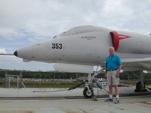 Lieutenant Colonel John Souders USMC (Ret.) next to the A-4 Skyhawk.