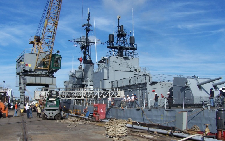 Lshy1 Gangway being attached from Laffey to pier at Detyen's shipyard.