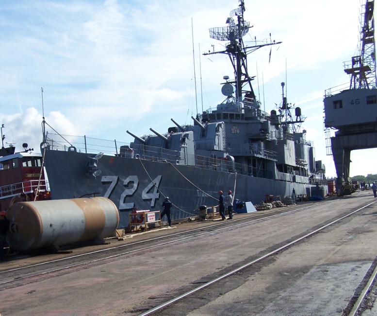 Laffey being nudged to her temporary berth at Detyen's shipyard, the former Charleston Naval Base.