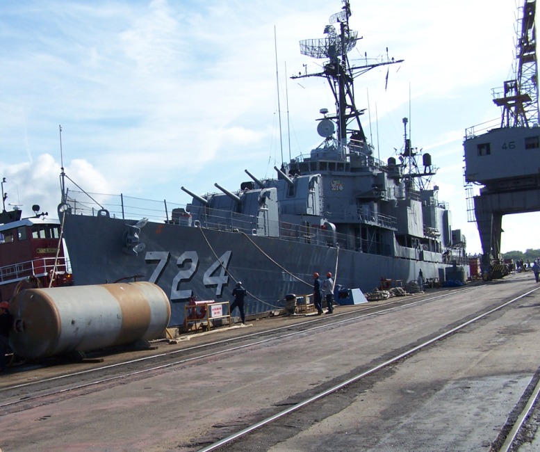 Lshy2 Laffey being nudged to her temporary berth at Detyen's shipyard, the former Charleston Naval Base.