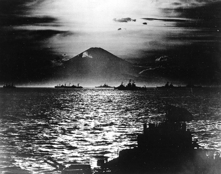 sunsetJE With Allied warships anchored in Sagami Wan, the sun sets behind Mt. Fugiyama and on the Japanese Empire.