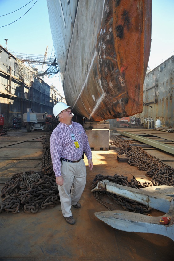 091022_SenMc-Laffey-008 Executive director Dick Trammel inspects repairs on the bow of Laffey.