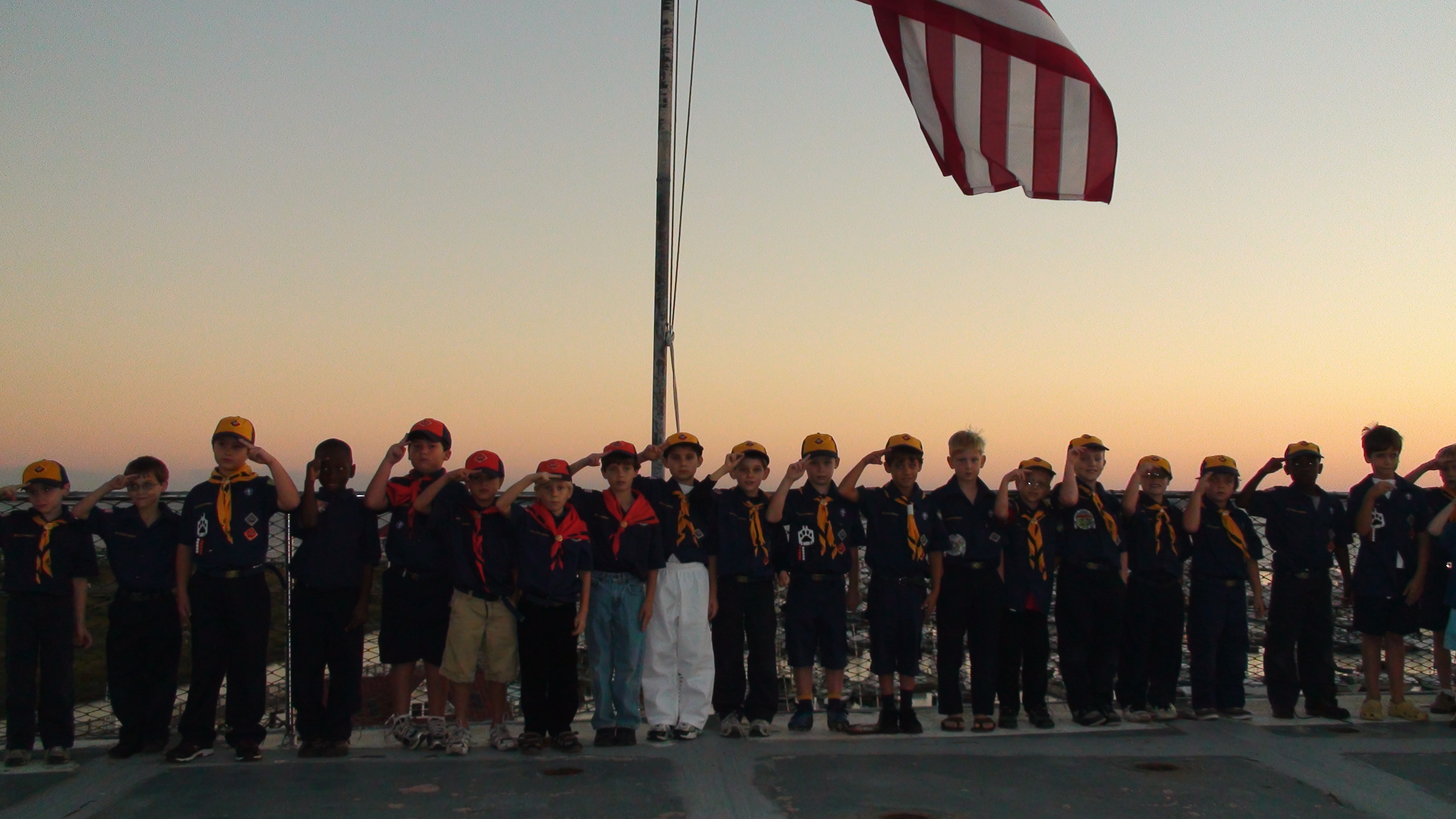 cubs102109cv10 Cub scouts assembled on the aft end of the flight deck for flag program.