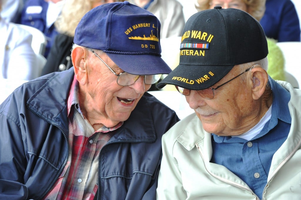 Gordon Chambers (left) and Brian Rowell talk at the memorial