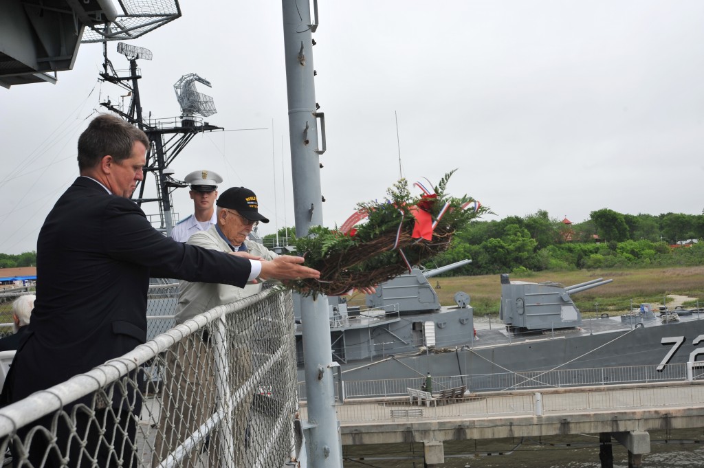 Brian Rowell tossed a wreath in memory of his crewmates from the USS Lindsey