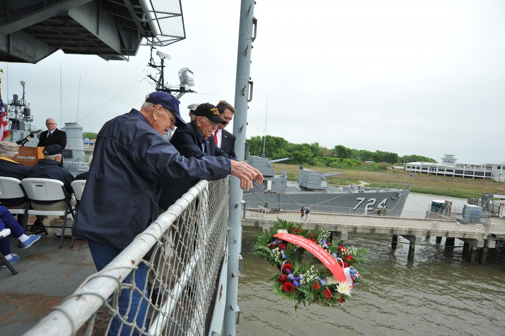 David Thomason and Gordon Chambers laid a wreath in memory of their fellow sailors on the USS Mannert Abele