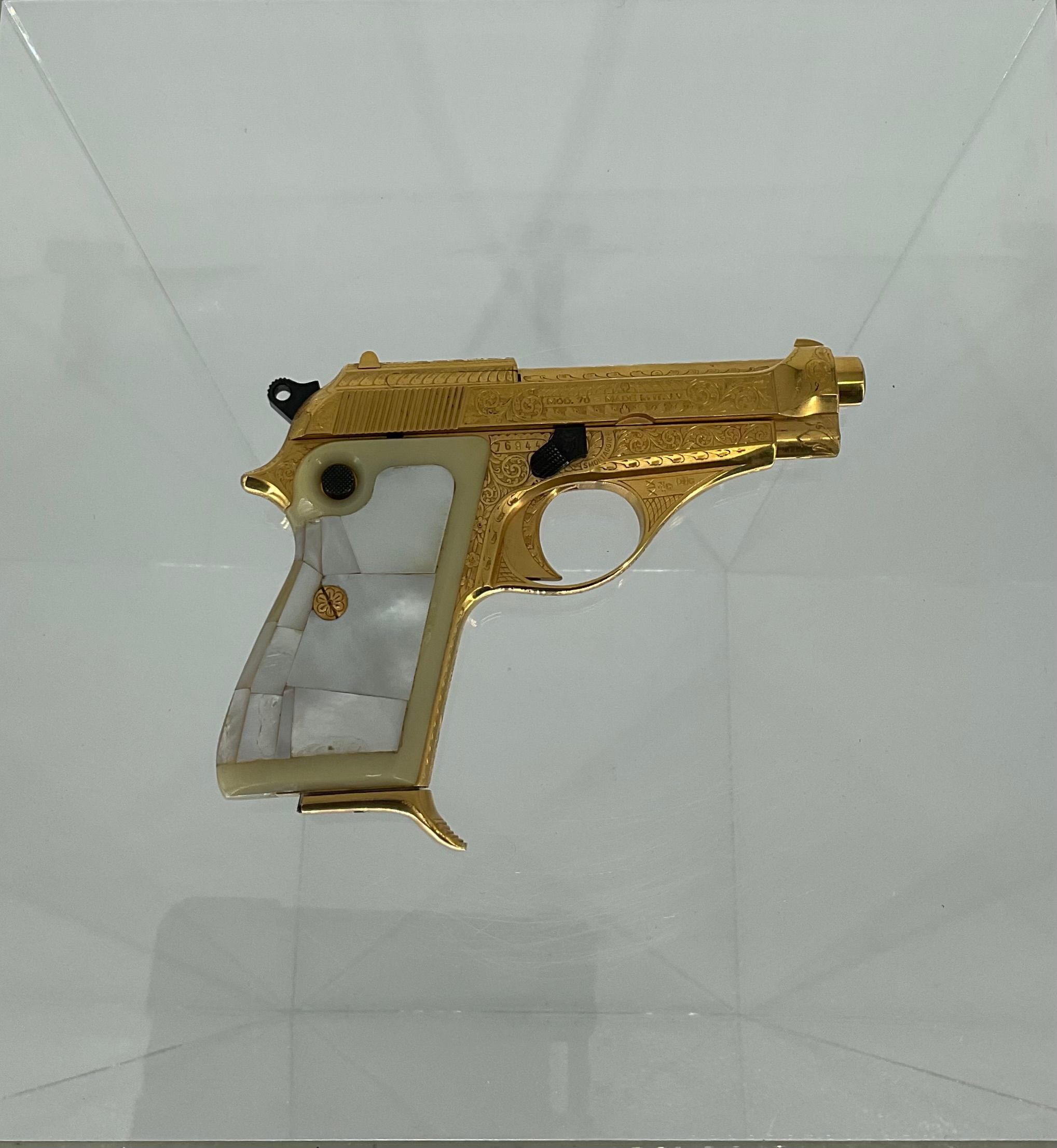 Gold-Plated Beretta of James Cain | Patriots Point Naval
