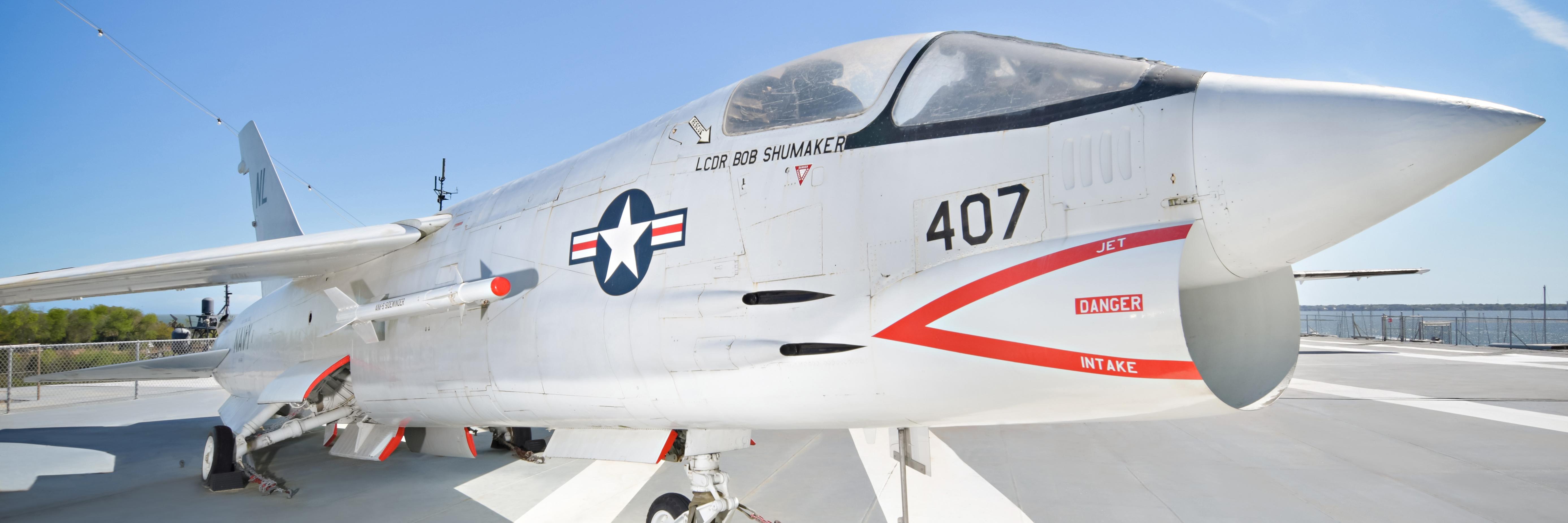 image of an aircraft sitting on the flight deck of a ship