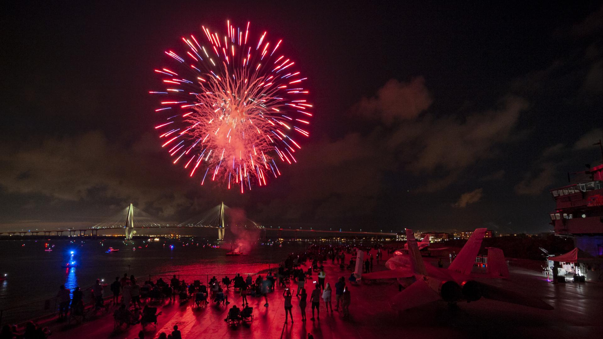 Fireworks blast near the USS Yorktown