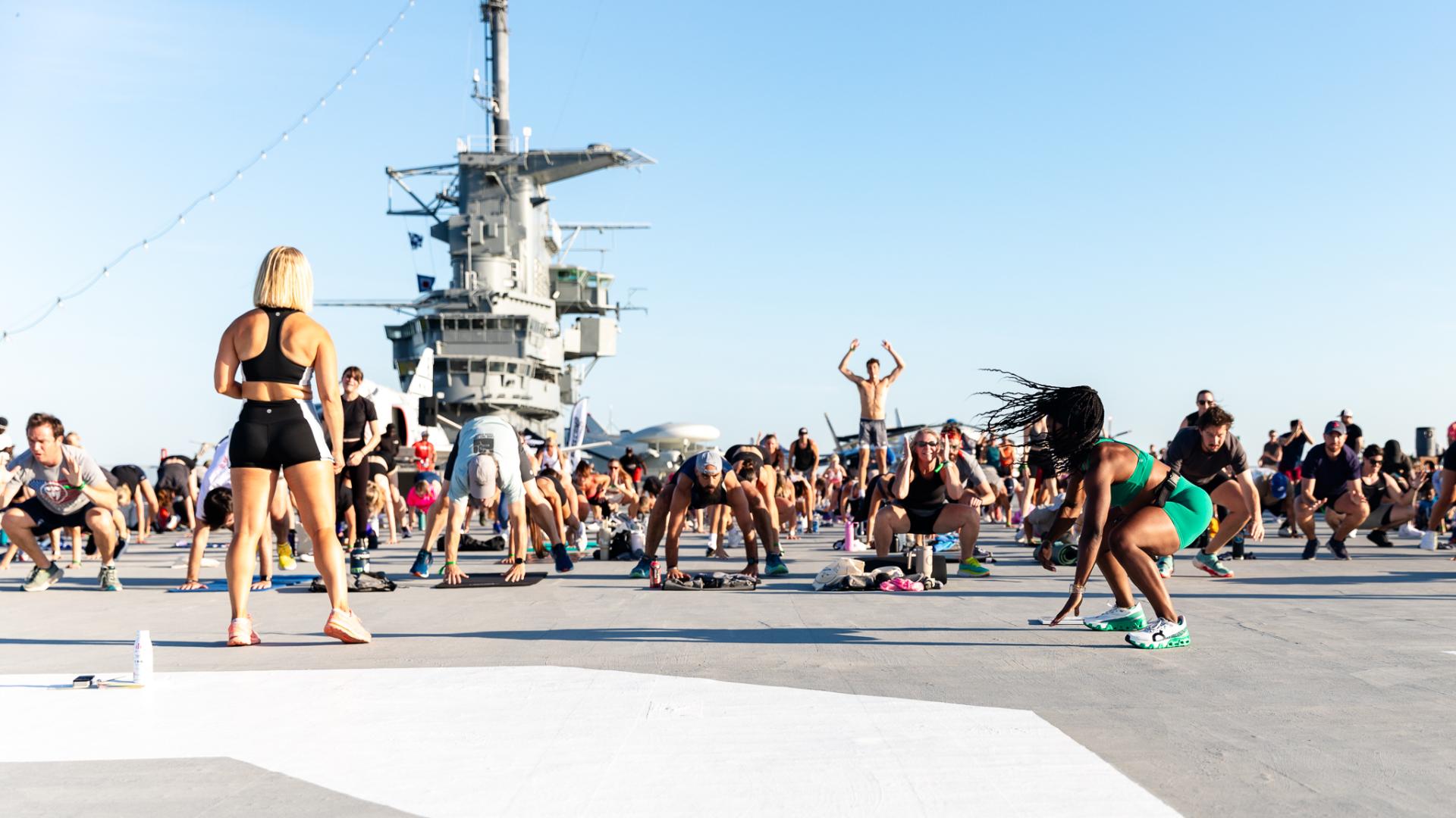 People working out on the flight deck of the USS Yorktown.
