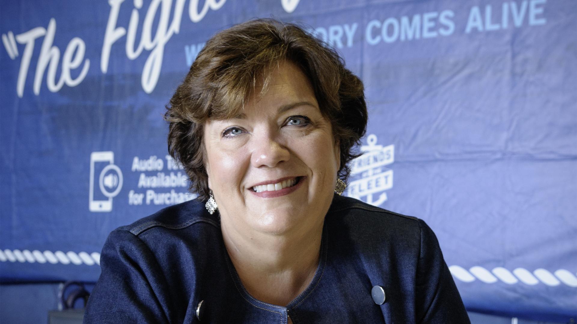Image of Beverly Hardin at the Welcome Desk at Patriots Point