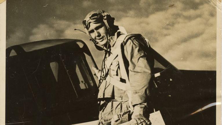 Image of Smokey Stover boarding a plane.