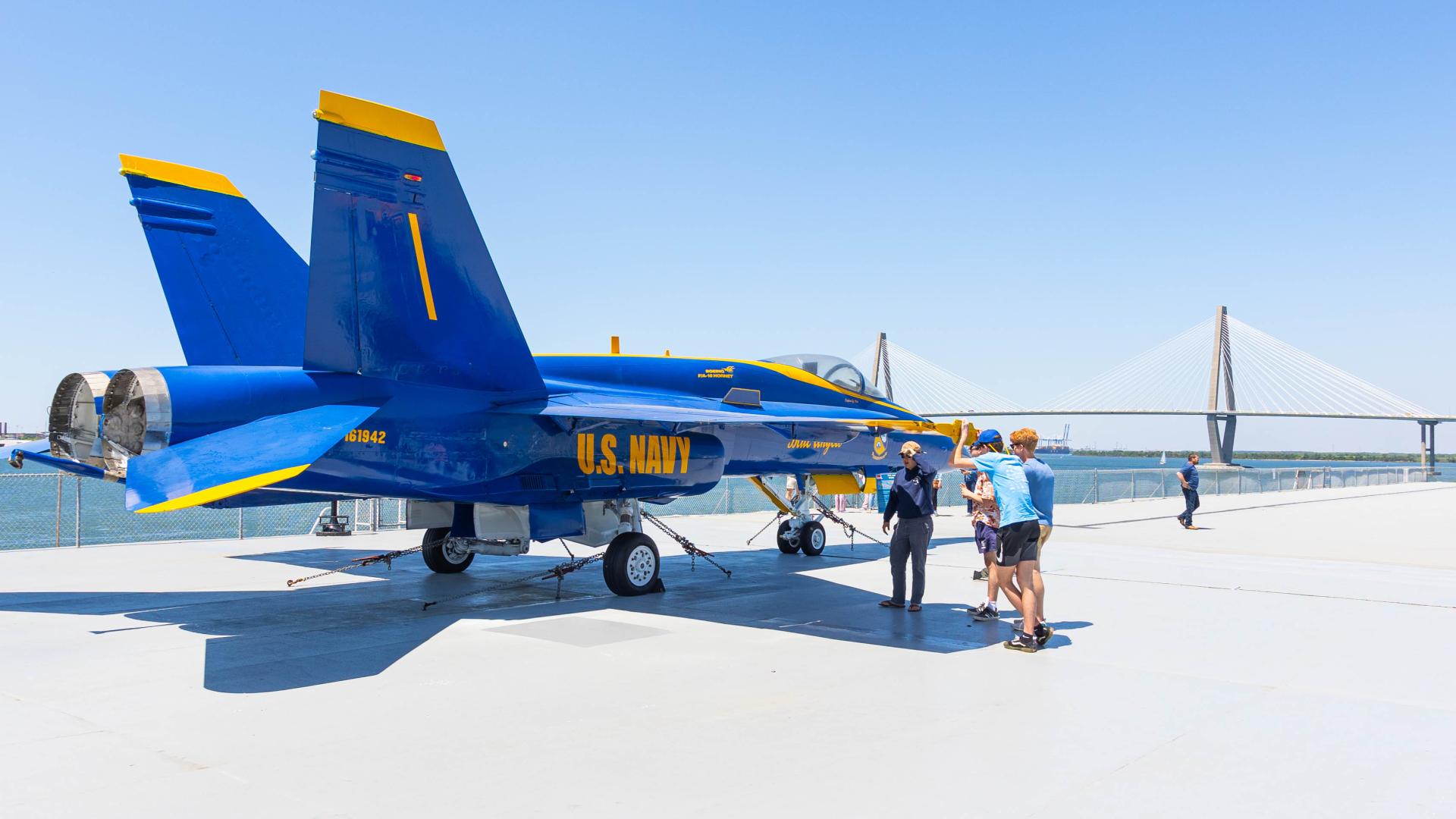 Family viewing the F/A-18A Hornet Blue Angels