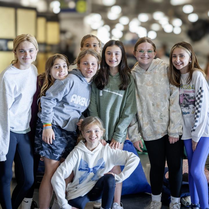 A group of girls pose for a picture during Operation Overnight.