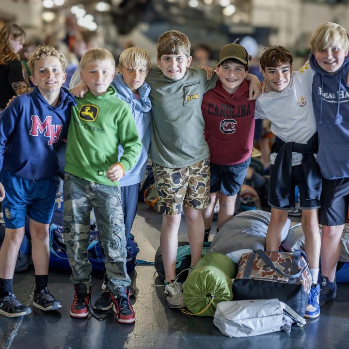 A group of boys pose for a picture during Operation Overnight.