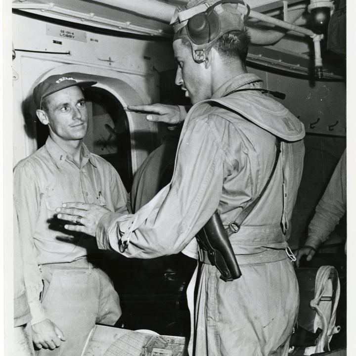 Primary Image of Pilots Discussing Maneuvers and Tactics Aboard The USS Yorktown (CV-10)