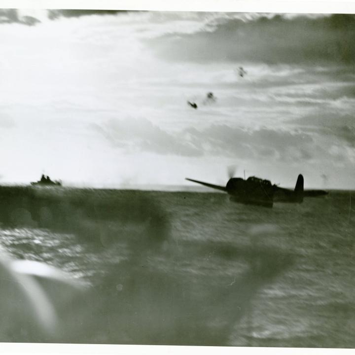 Primary Image of Japanese "Jill" Passing Over the USS Yorktown (CV-10)