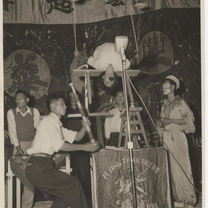 Primary Image of The Flying Tiger Troupe Spinning Plates