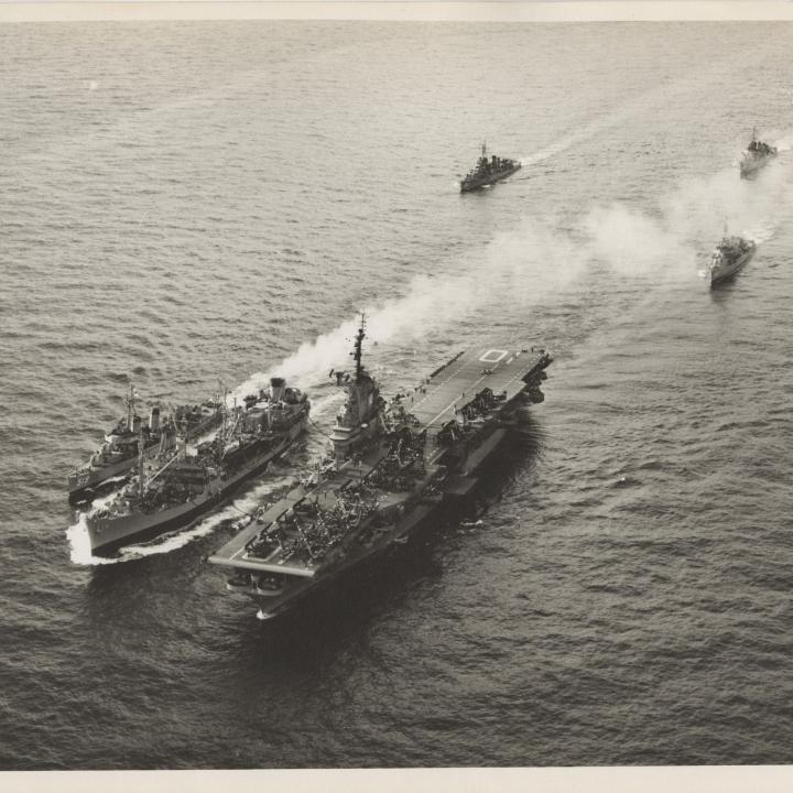 Primary Image of USS Yorktown (CVA-10) and USS Daly (DD-519) Being Refueled by a Supply Ship