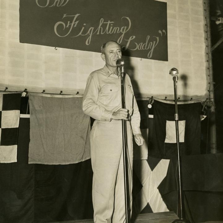 Primary Image of Captain Thomas Combs Speaking on Stage