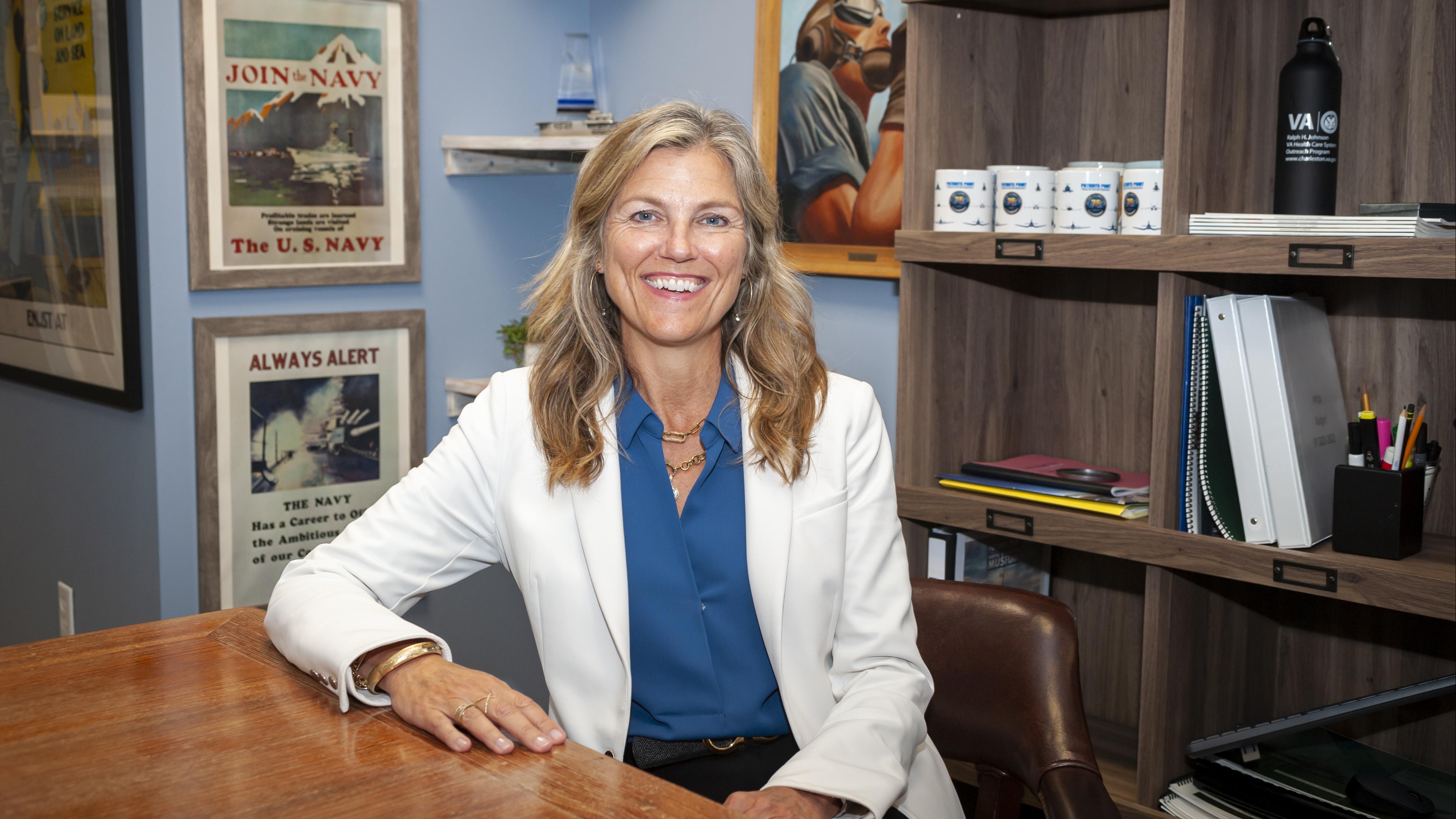 Allison Hunt sits at her desk aboard the USS Yorktown.