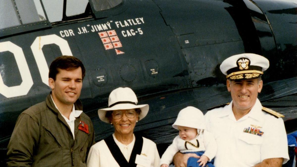 Flatley Family in front of Vice Admiral James Henry Flatley Jr. aircraft