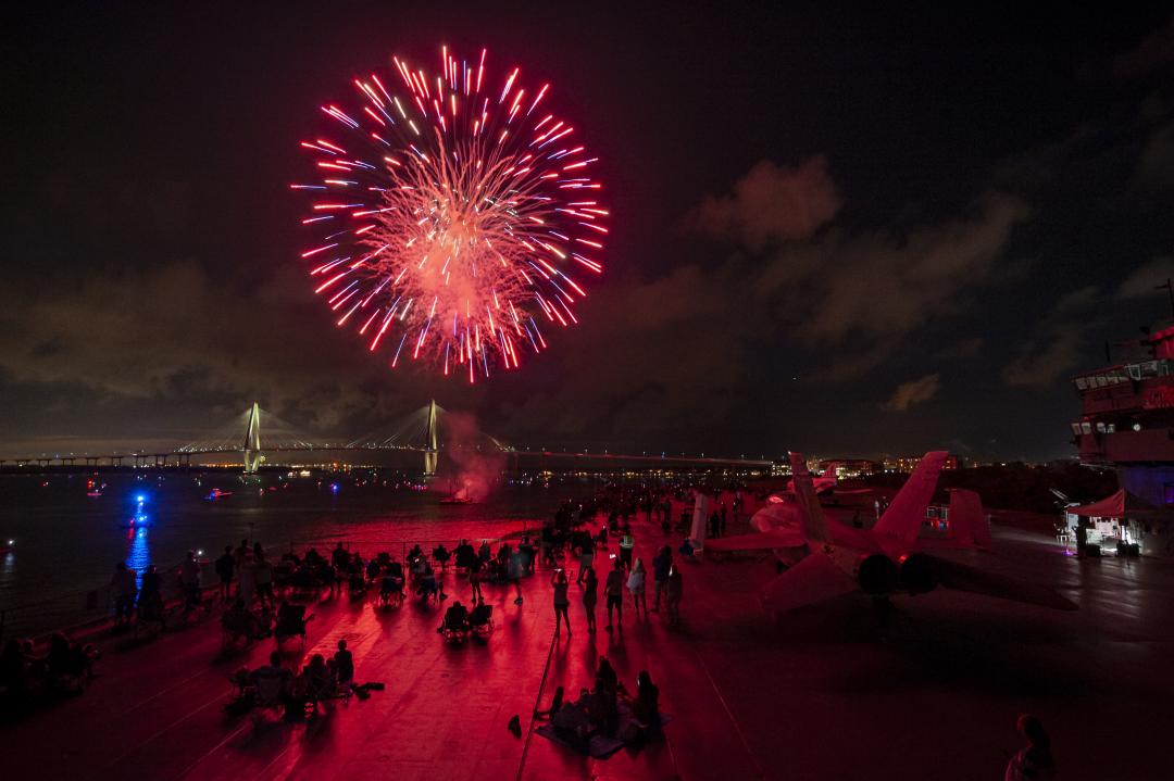 Fireworks blast near the USS Yorktown