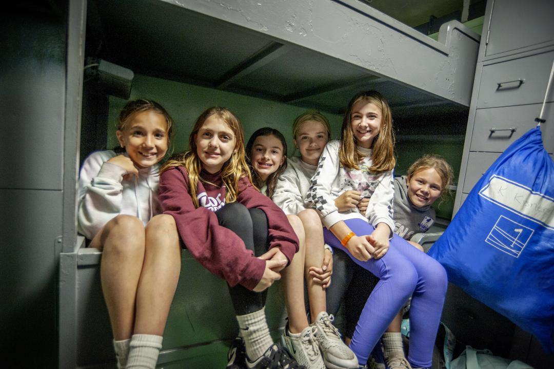 A group of girls pose for a picture during Operation Overnight.