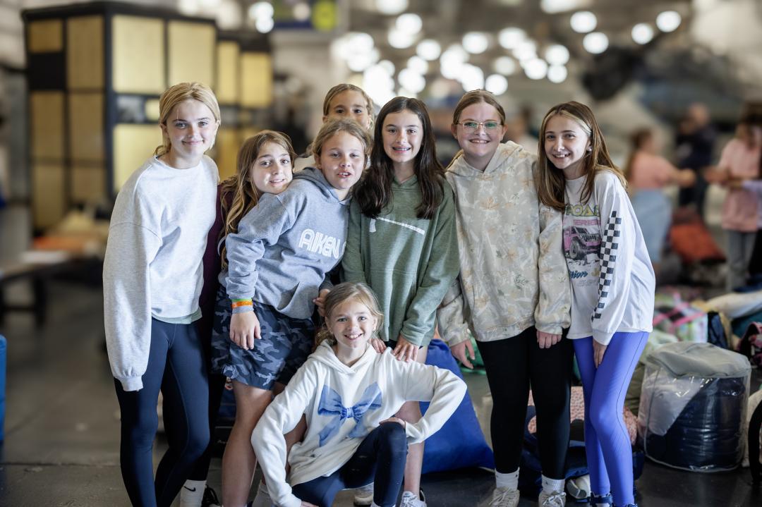A group of girls pose for a picture during Operation Overnight.